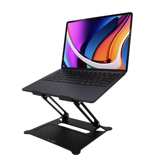 SenseAGE Laptop Stand in matte black, displayed on a desk supporting a laptop.