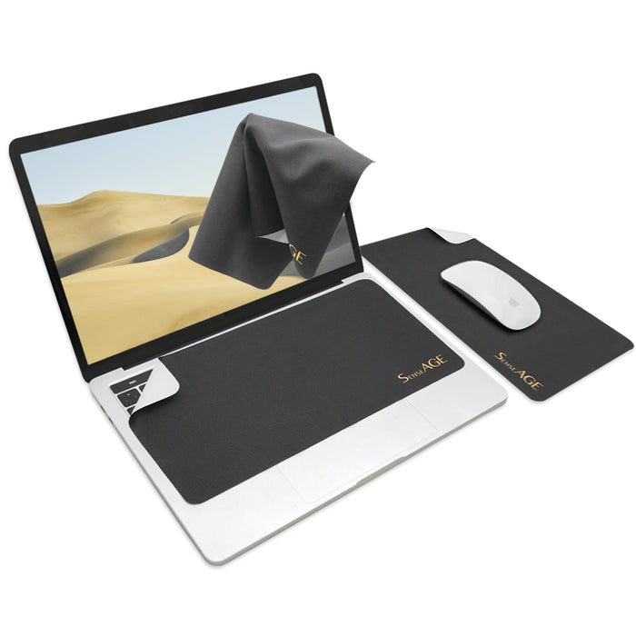 SenseAGE 3-in-1 Portable, Washable Mouse Pad and Keyboard Cloth set. A MacBook is shown with a keyboard cloth on the keyboard, a cleaning cloth on the screen, and a mouse pad next to the laptop with an Apple Magic Mouse on it. All items are branded with the SenseAGE logo.
